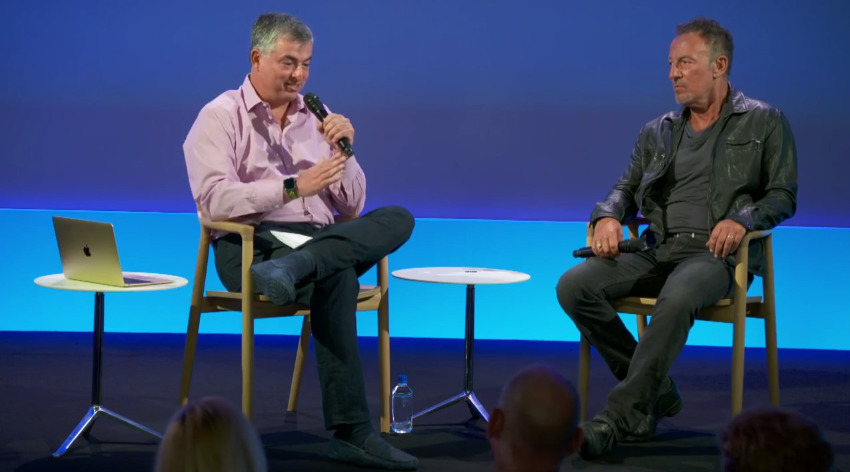 photo of Eddy Cue talks music with Bruce Springsteen at Apple's SoHo store image