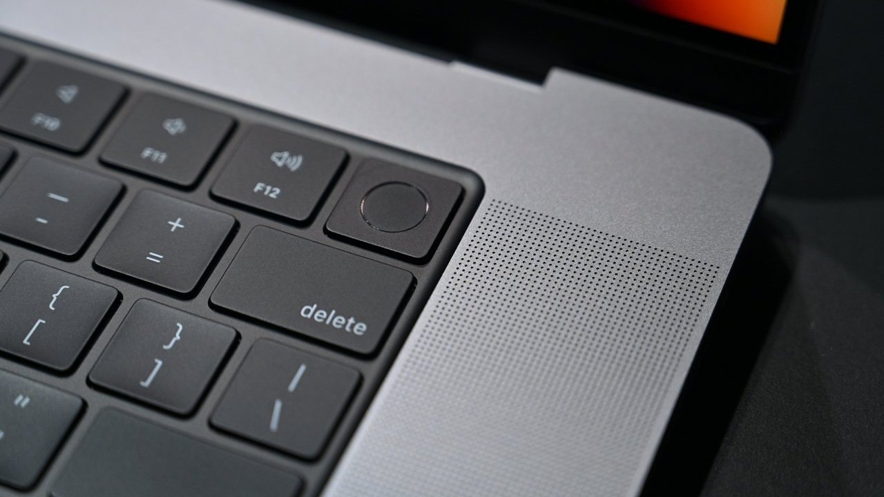 The MacBook Pro has a fingerprint sensor in the keyboard tray