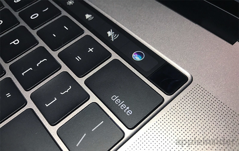 Image of the Mac keyboard and touchbar zoomed in on the backspace/&quot;delete&quot; key showing how close the Siri button is.