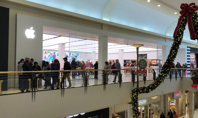 Apple store with macbook shaped roof opens in chicago