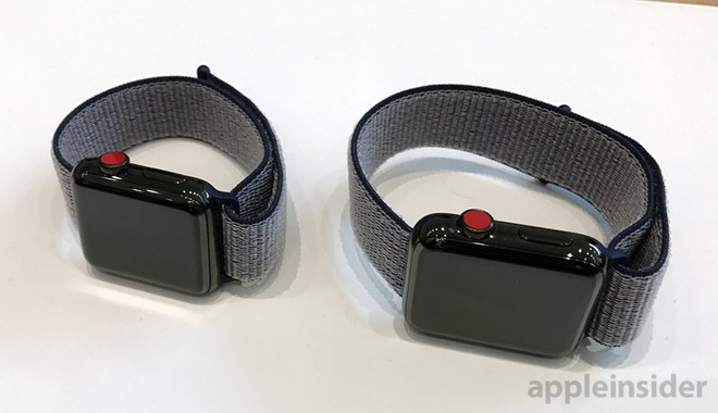 Two Apple Watches on a table