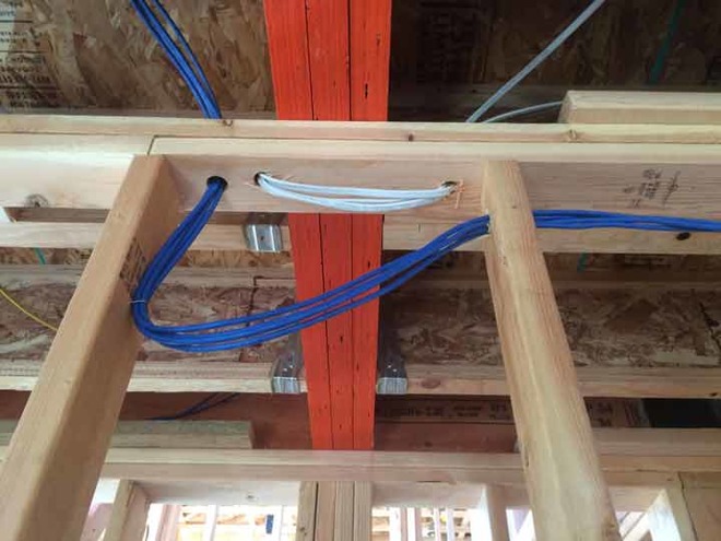 Running Ethernet is easy, before the drywall goes on.