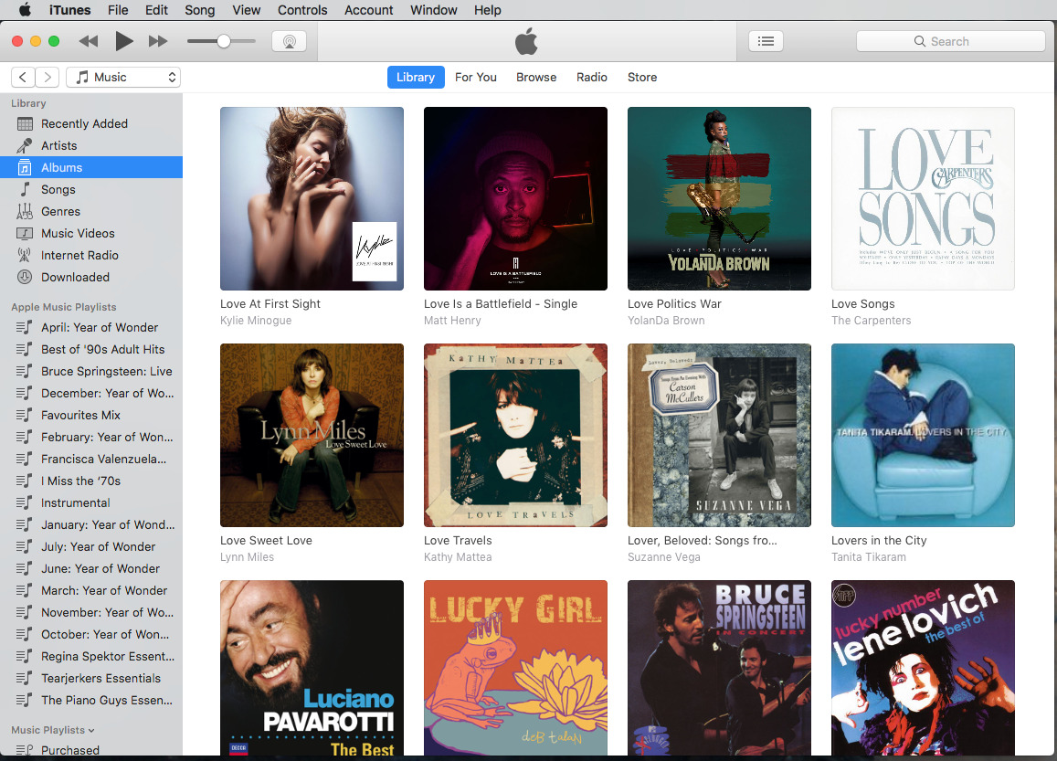 Ejemplo de biblioteca de iTunes con ilustraciones de álbumes