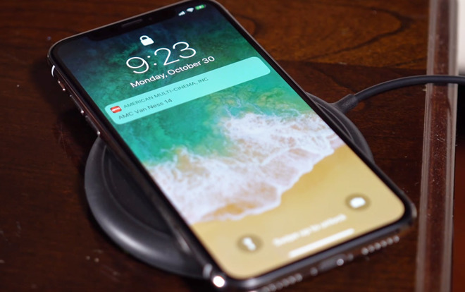 Apple iPhone on wireless charging mat