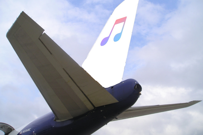 Tail detail of a 767 aircraft with Apple Music logo