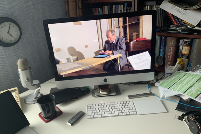 A video screensaver playing on an iMac