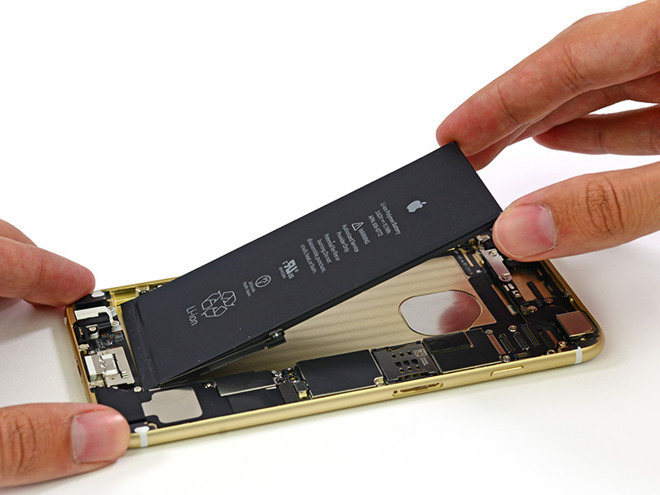 An iPhone 6 Plus battery being removed (Credit: iFixit)