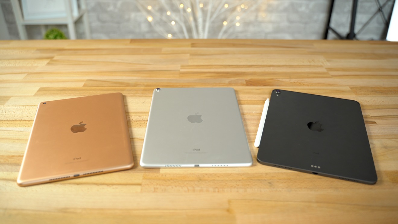 iPad and iPad Pros on a desk