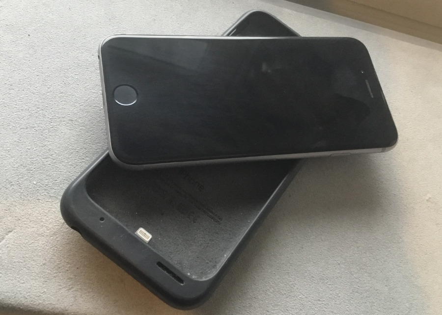 An iPhone 6 with the original 2015 Apple Smart Battery Case