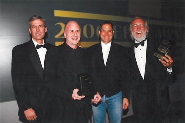 Ken Segall (second from left), Steve Jobs (second from right)
