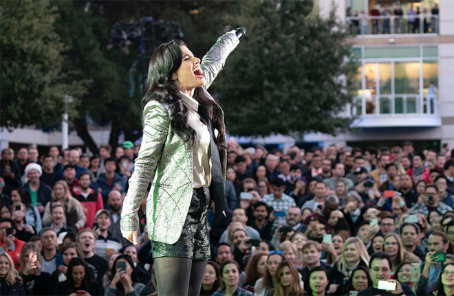 Idina Menzel performs at Apple's holiday Beer Bash. | Source Tim Cook via Twitter