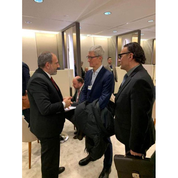 photo of Apple's Tim Cook meets with power brokers at Davos, says education efforts 'for the people' image