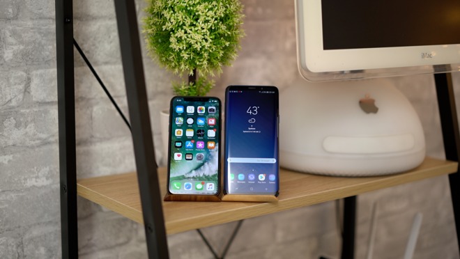 The iPhone X next to the Galaxy S9