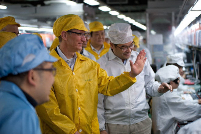 Apple CEO Tim Cook visits a Foxconn facility