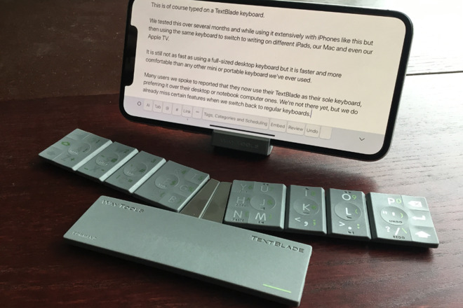Using a TextBlade keyboard with an iPhone XS Max on the provided stand