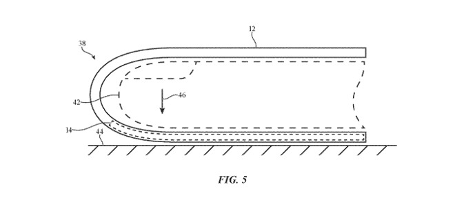 A cross-section of a glove finger, illustrating the placement of a force sensing circuit.