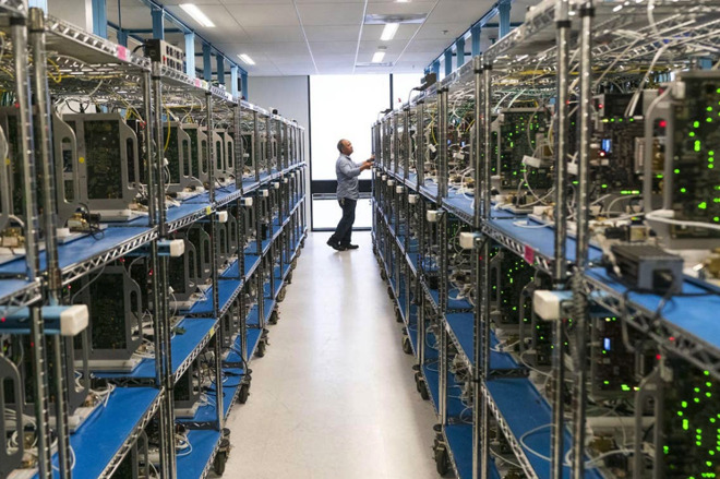 A worker inside one of Apple's testing facilities. (Photo: Brooks Kraft/Apple)