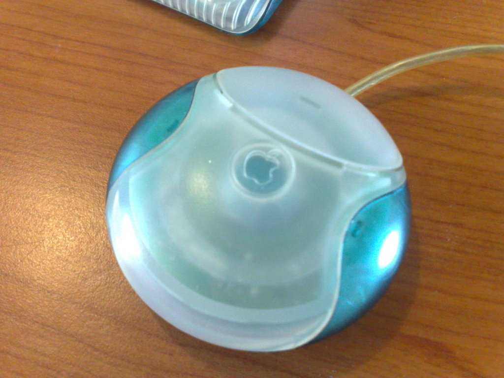 Original blue and white hockey puck mouse, without mouse button indent