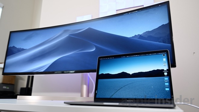 The 49-inch LG UltraWide and a 15-inch MacBook Pro