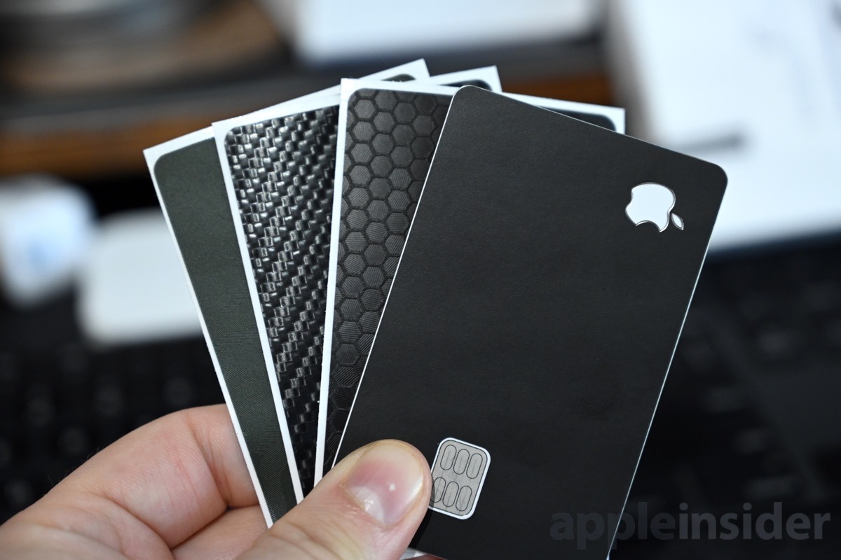 Camo, carbon fiber, swarm, and matte black dbrand Apple Card skins