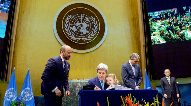 Secretary John Kerry signs Paris Agreement on behalf of the US in 2016