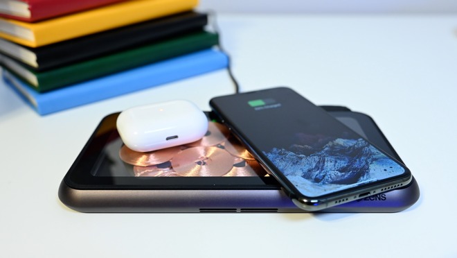 Zens Liberty in the special edition glass top charging an iPhone and AirPods Pro