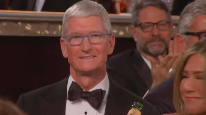 Tim Cook, and, far right, Jennifer Aniston, at the Golden Globes