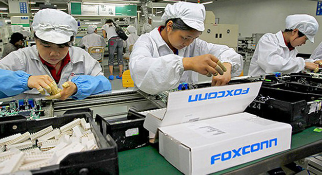 Foxconn factory workers often work in very close contact with each other