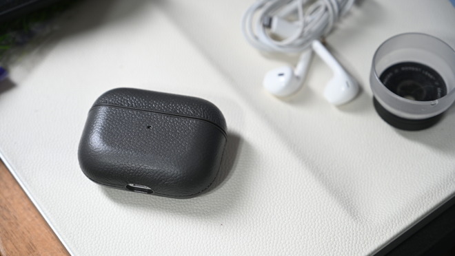 Courant's AirPods Pro case on the Courant wireless charging valet