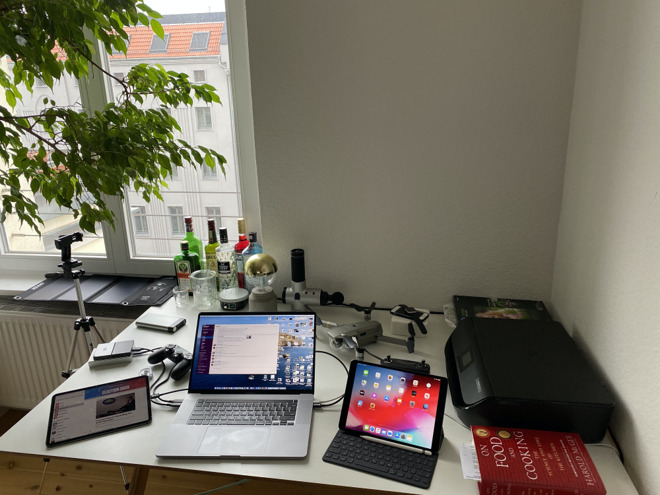 Daniel Eran Dilger's desk must be about two-thirds serious Apple gear, and one-third interesting toys.