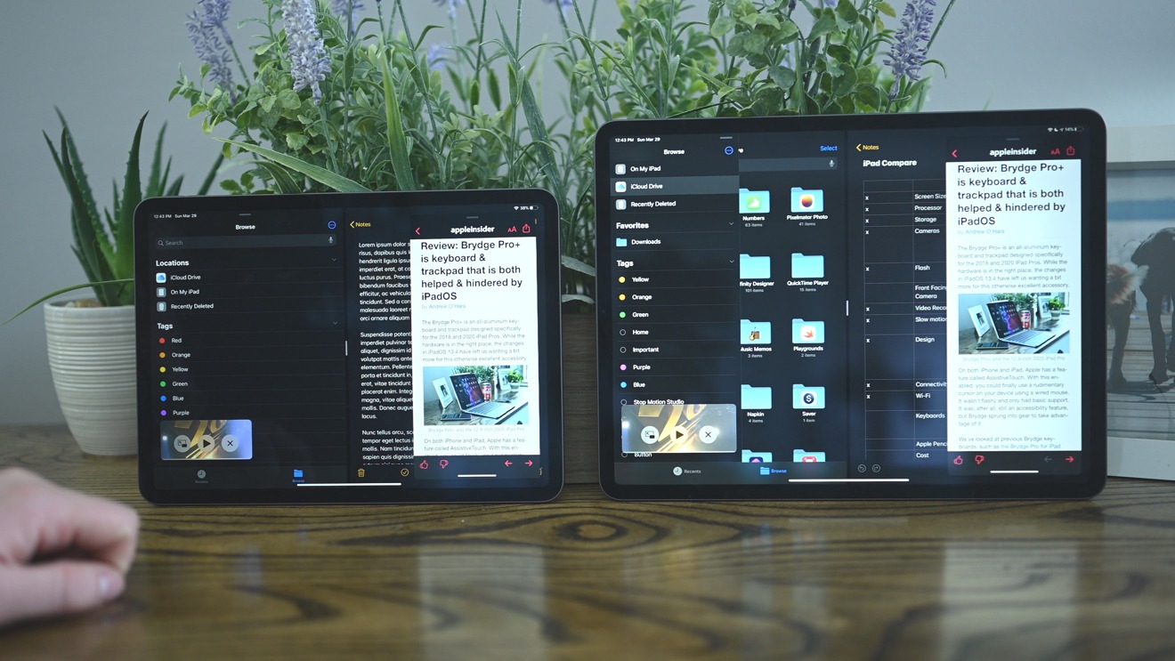 An 11-inch (left) and 12.9-inch (right) iPad Pro with two apps in split view, one app in slider over, and a movie playing in PiP