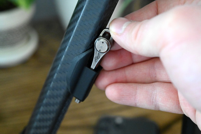 A useful hex wrench is clipped to the side of one of the three tripod legs