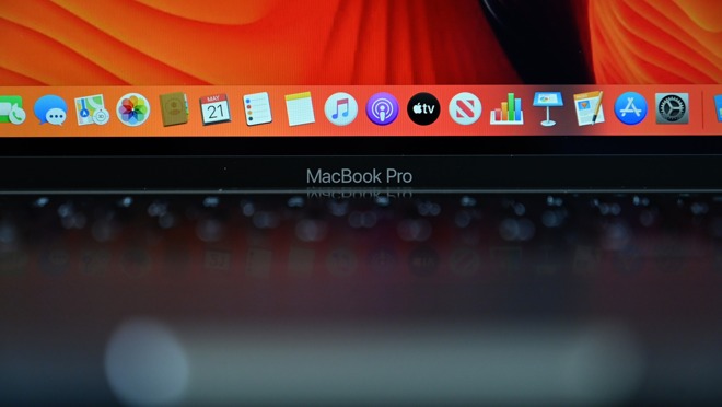 Closeup of the MacBook Pro logo below the gorgeous Retina display