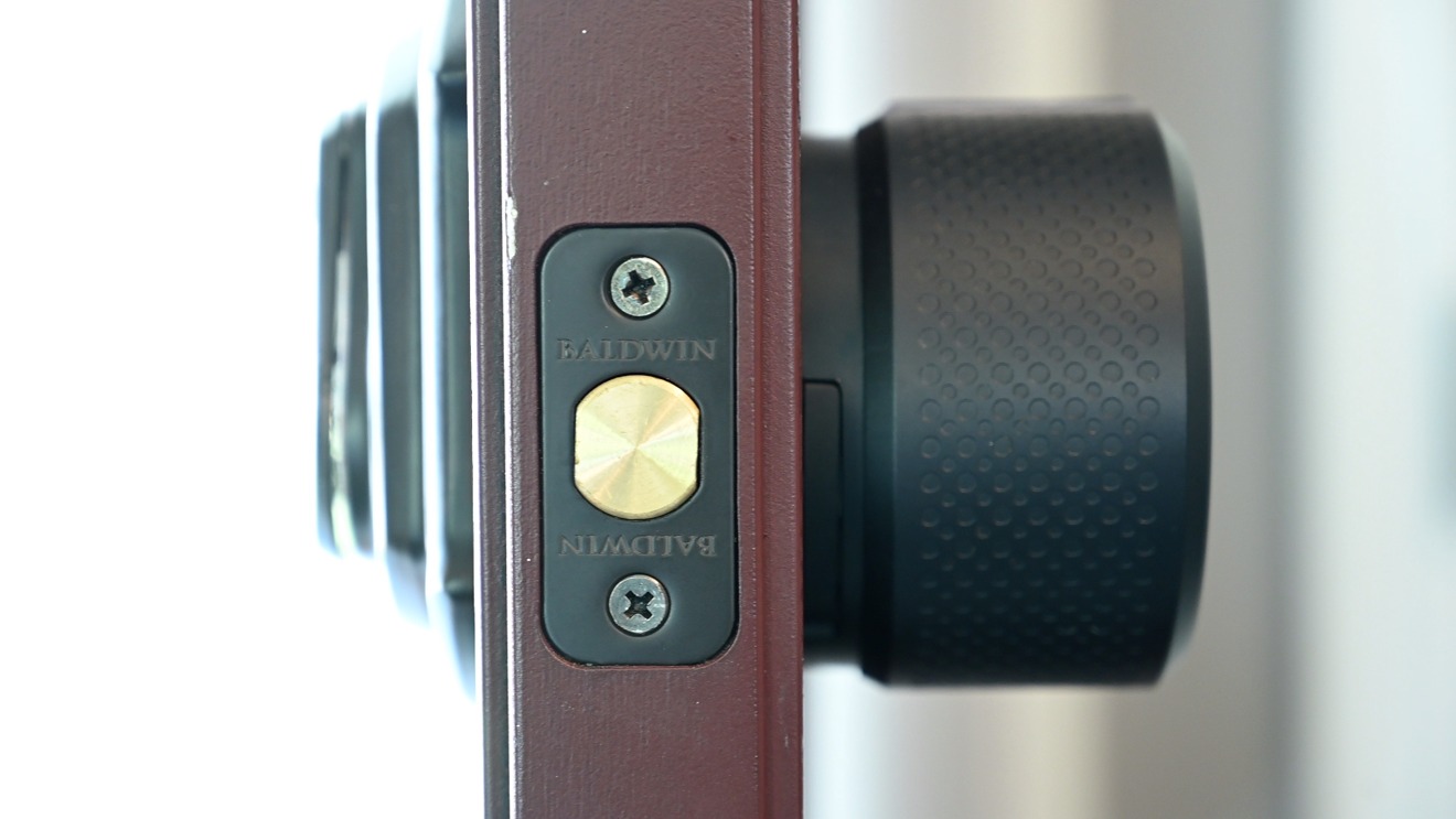 The August smart lock adds a large cylinder inside the door