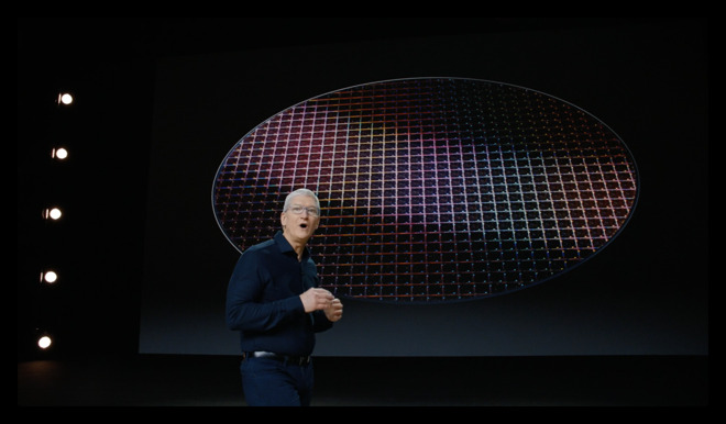 Tim Cook, at WWDC 2020, with an Apple Silicon wafer