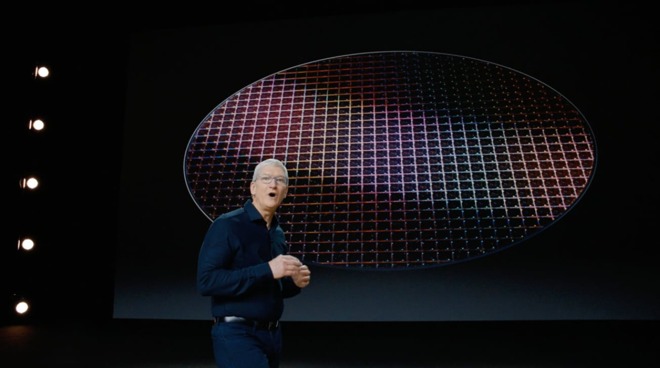 Apple CEO Tim Cook at WWDC 2020, in front of an Apple Silicon wafer.