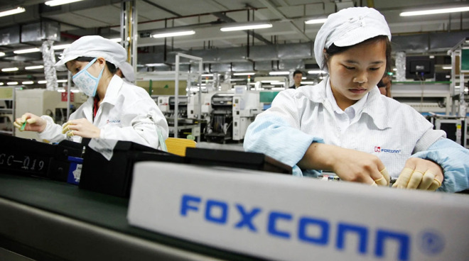 Workers on a Foxconn assembly line.