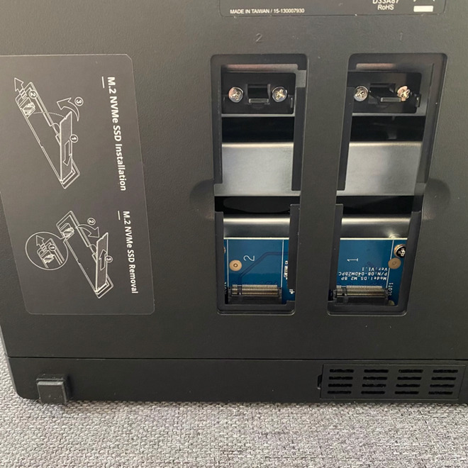 Slots for installing M.2 NVMe drives into the NAS.