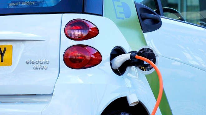Current electric vehicles need drivers to plug in the charging cables manually