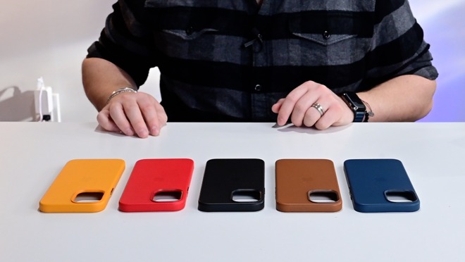 Apple's leather case colors from left to right: California Poppy, (PRODUCT)RED, Black, Saddle Brown, Baltic Blue