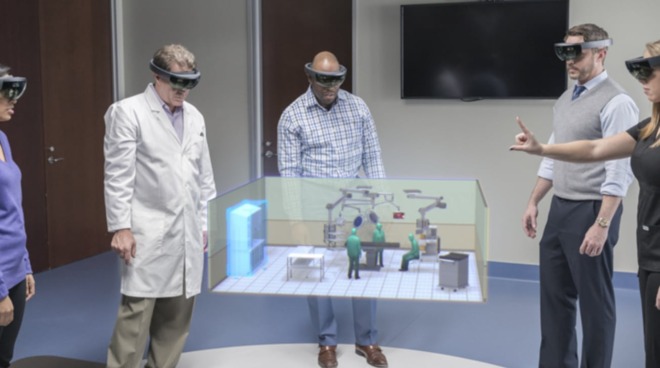 Microsoft's HoloLens, which can track fingers for input to control AR content.