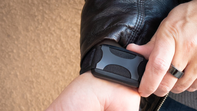 You can use the wearable's buttons to change intensity, pause, and start a session