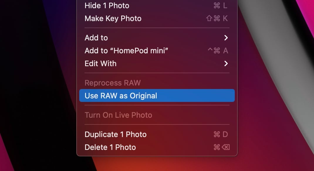 Accessing the 'Use RAW as Original' option in Photos menu system.