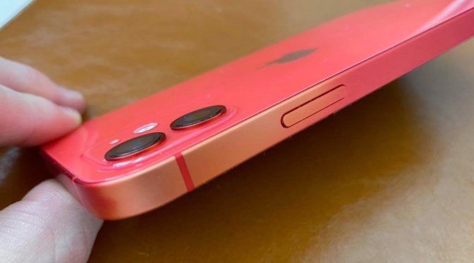 A discolored iPhone 12 in red [via SvetApple]