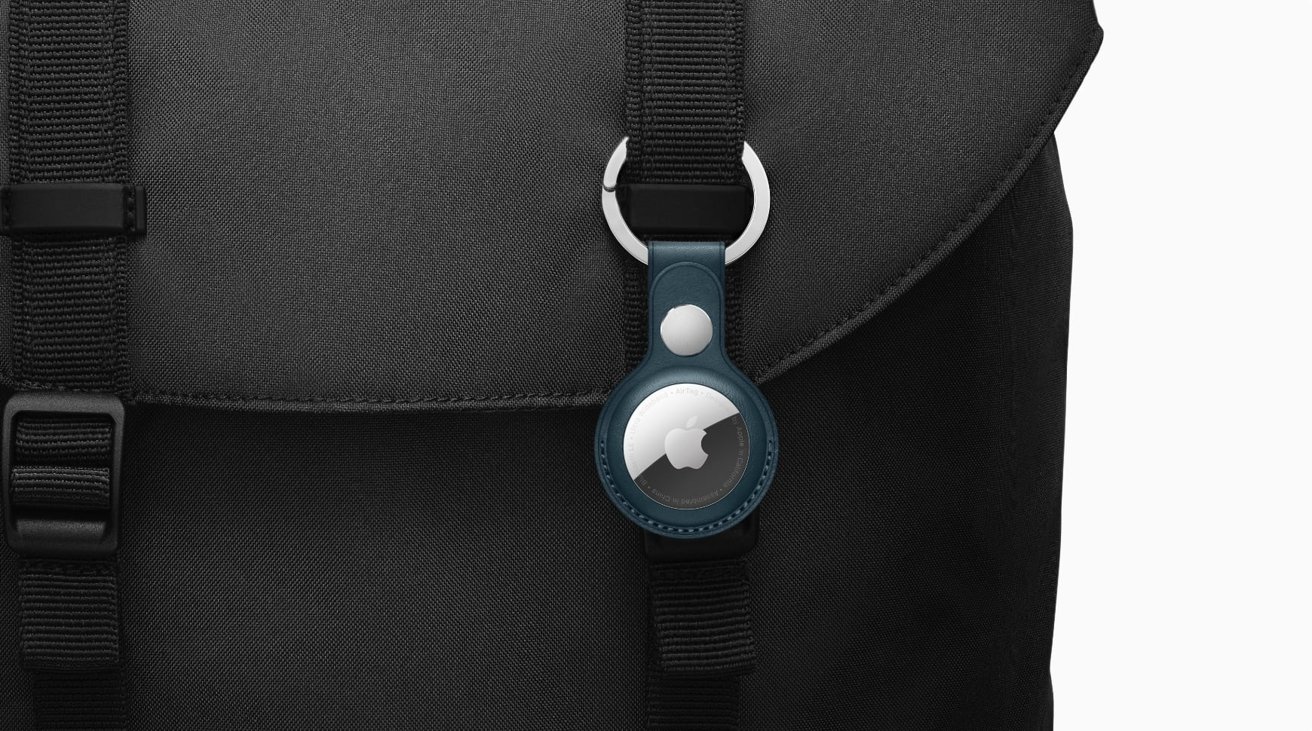 Apple AirTag with baltic blue key ring on black laptop bag