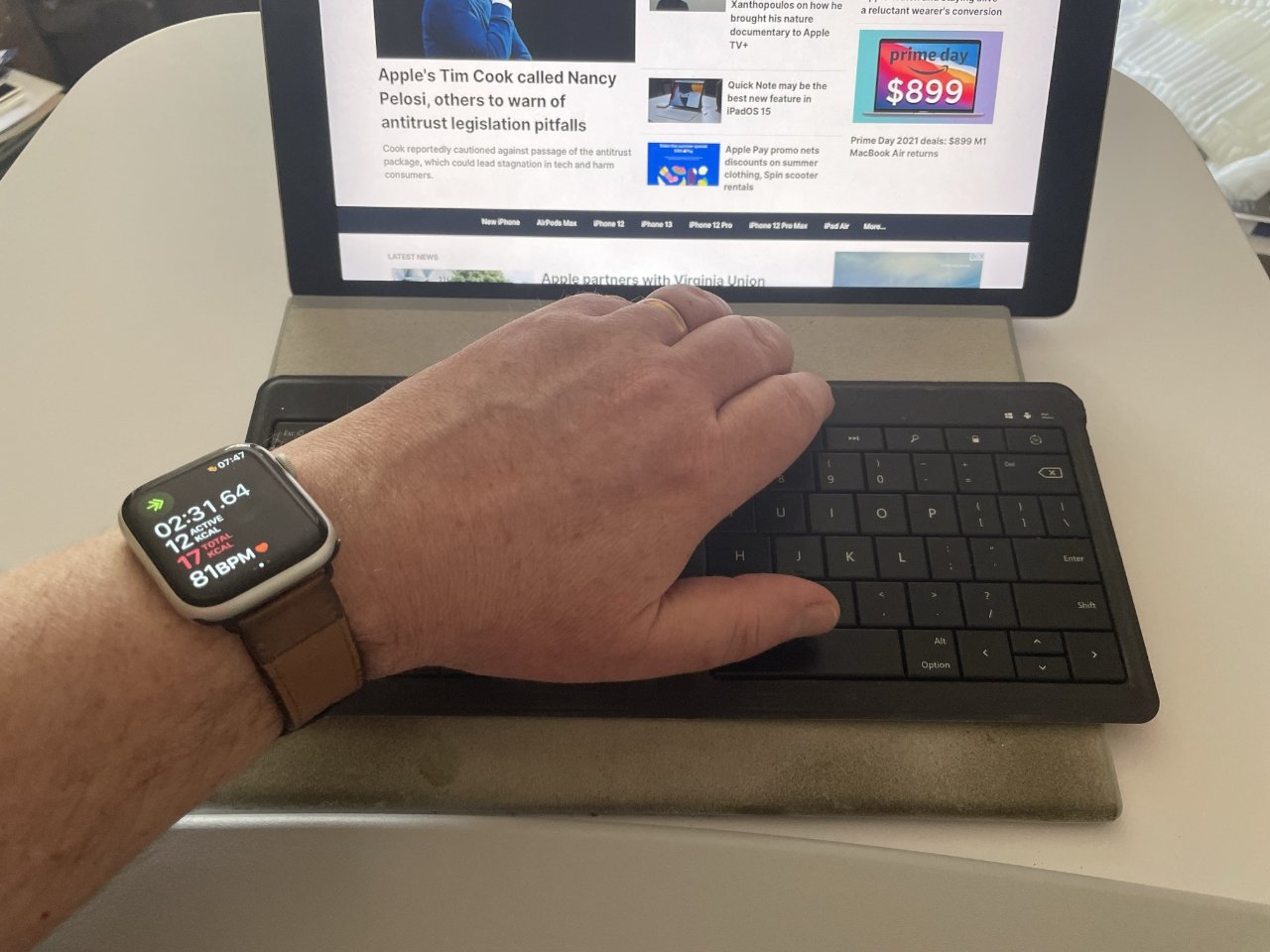 The optional extra desktop is small but big enough to work on. Notice the palm rest at the base of the desk, and my exhaustive exercise timing on the Apple Watch