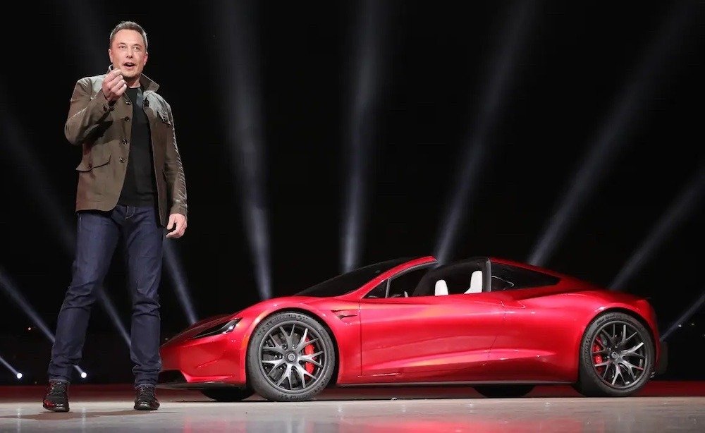 photo of Elon Musk takes jabs at Apple during Tesla earnings call image