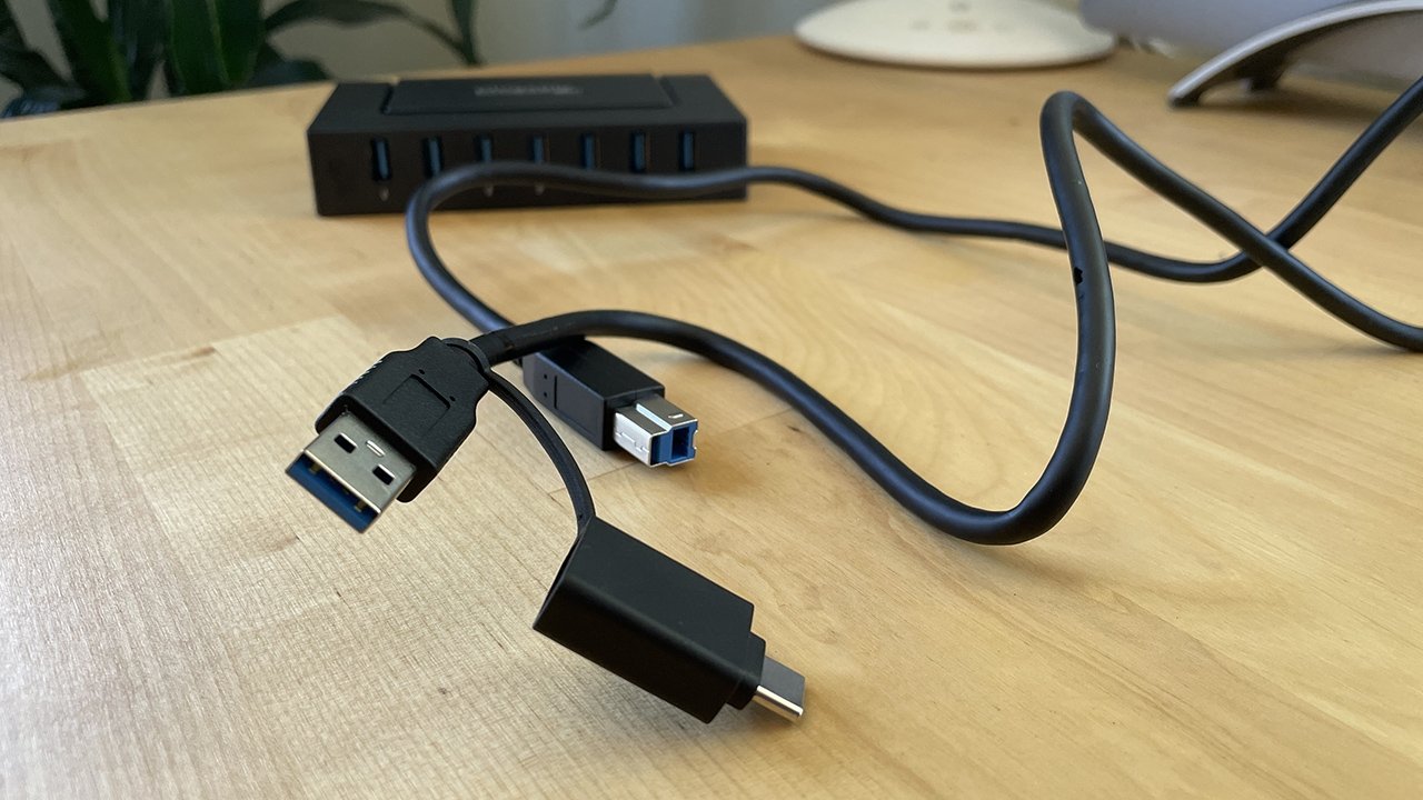 Alongside the power supply, the hub comes with a USB Type-B connector that attaches to your laptop via USB-A or USB-C.