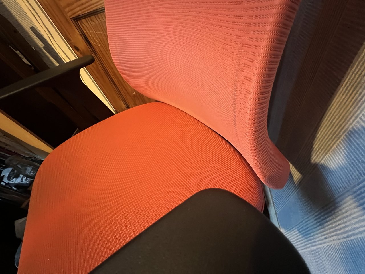 The rear of the chair is shaped to support your lower back