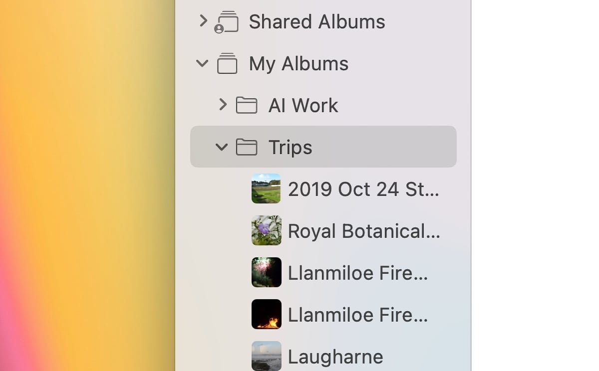 Folders containing albums will appear in the sidebar, and can be collapsed like any other. 